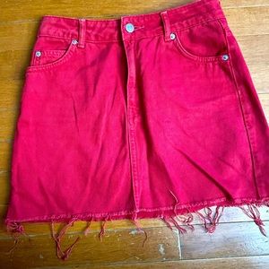 Red denim mini skirt